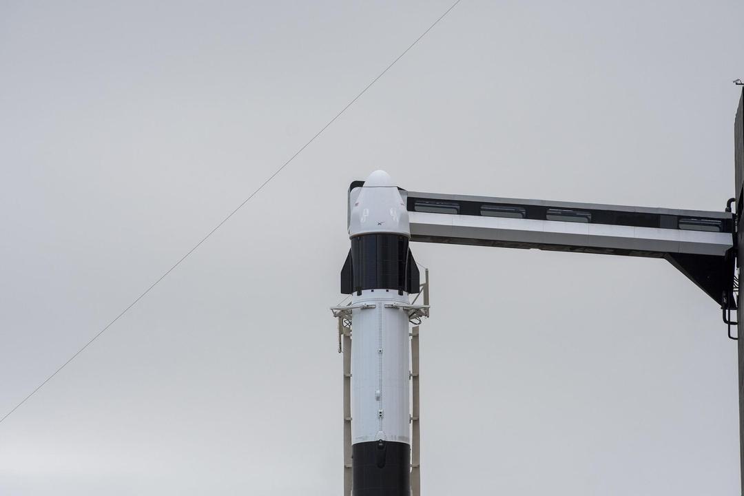 Cargo Dragon spacecraft atop the Falcon 9 rocket at LC-39A