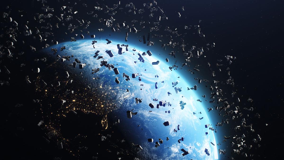 Space junk floats around Earth's orbit.