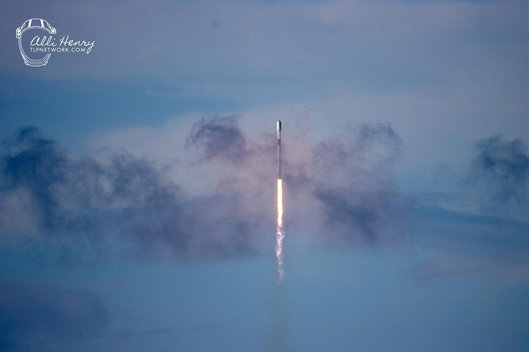 Falcon 9 sores through the clouds