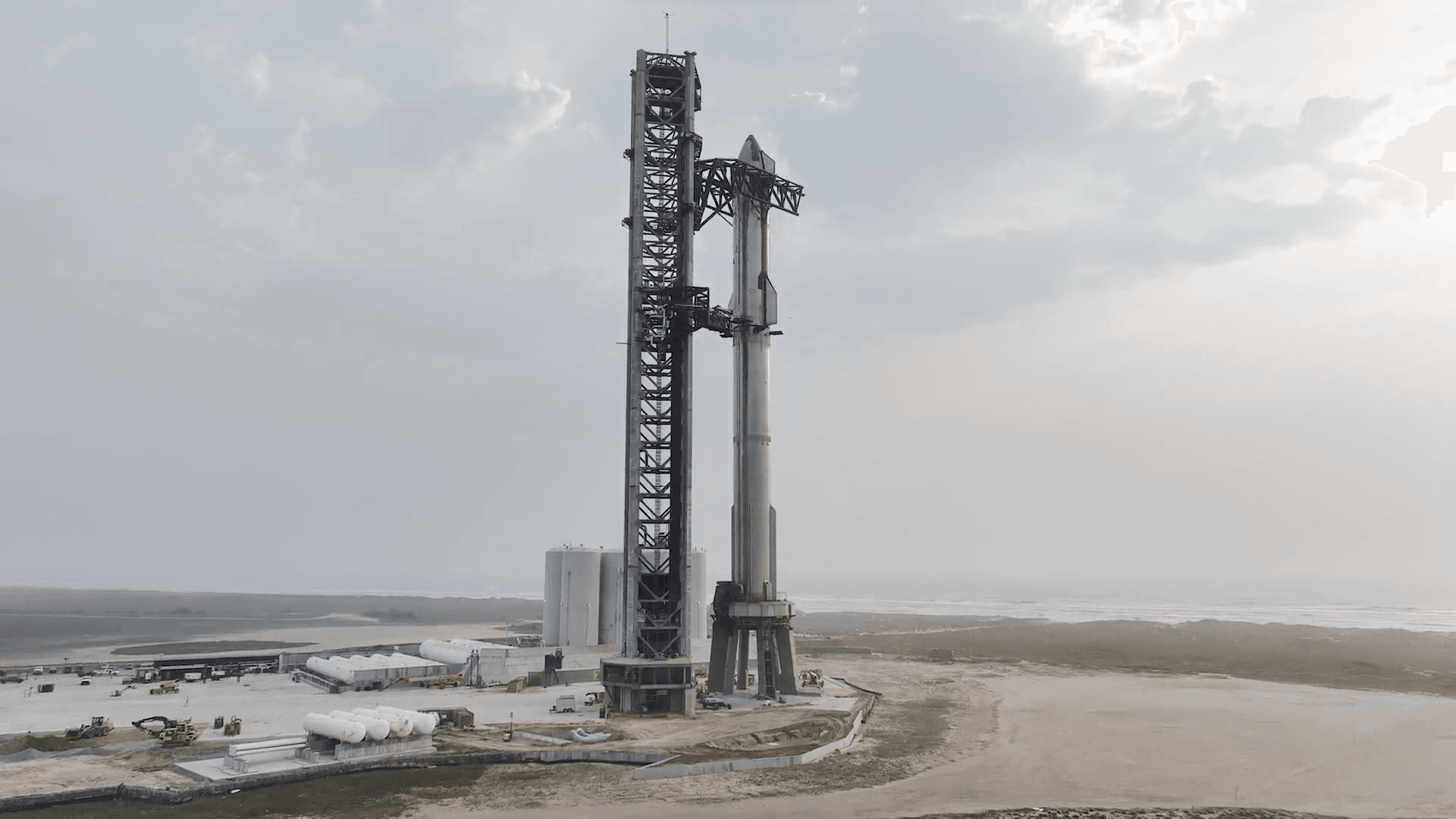 SpaceX's Ship 24 and Booster 7 fully stacked on the Orbital Launch Mount at Starbase, TX.